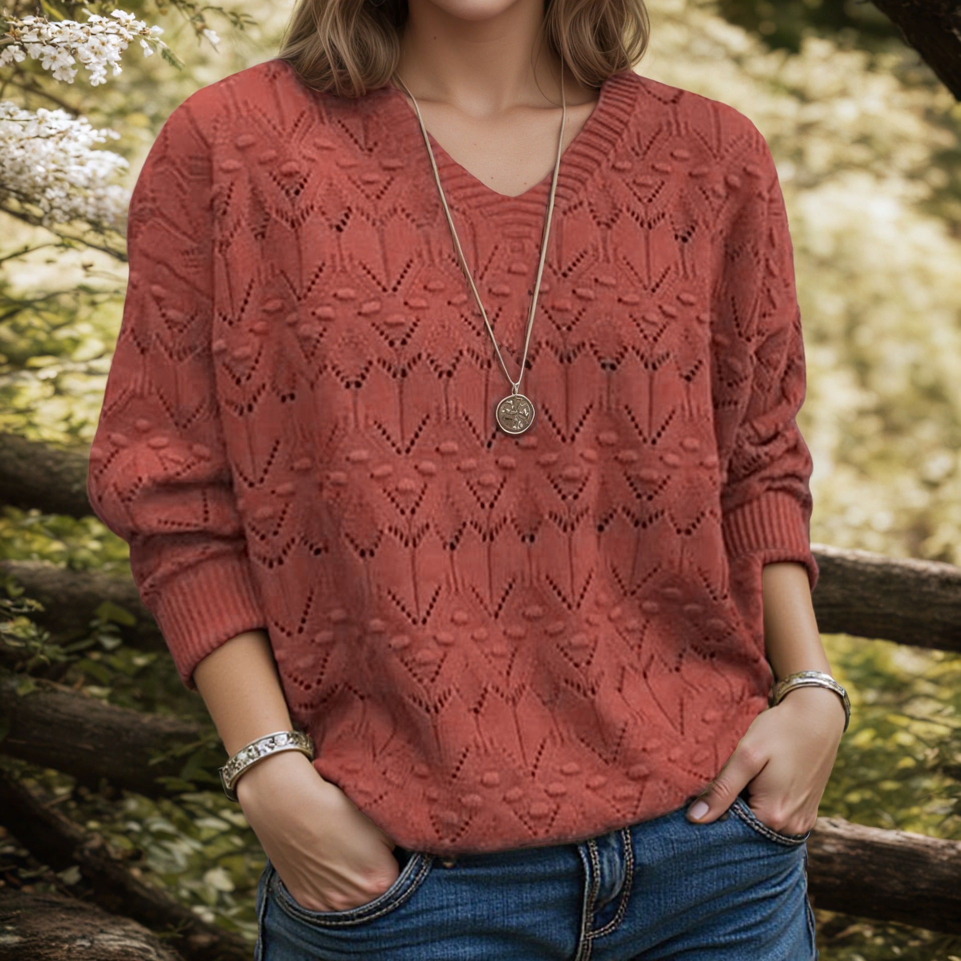 V-neck long sleeved solid color top with hollowed out pullover sweater for women